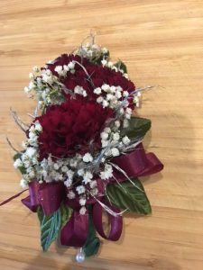 pin Corsage red carnations