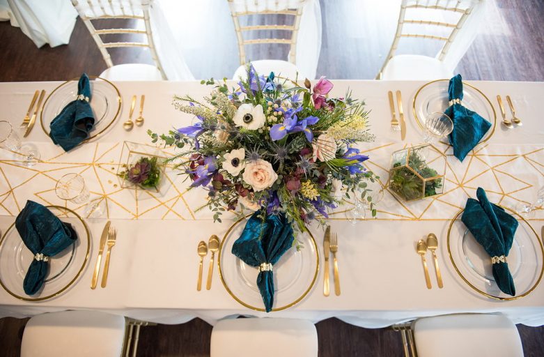 Geometric wedding reception tablescape flowers