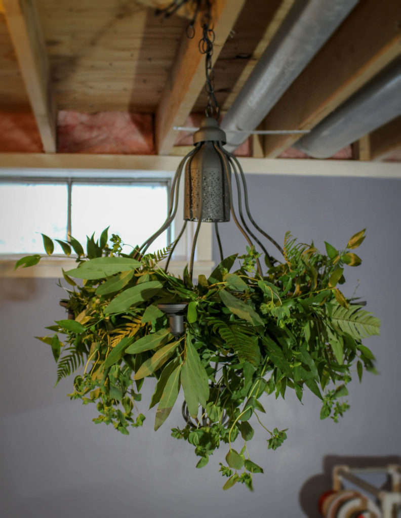 Greenery chandelier wedding rental floral design