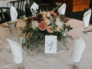 Burgundy blush wedding reception table centerpiece