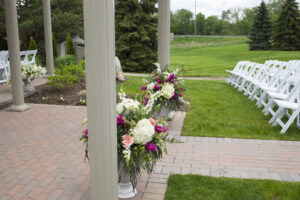 Outdoor ceremony flower arrangements pink white fuchia