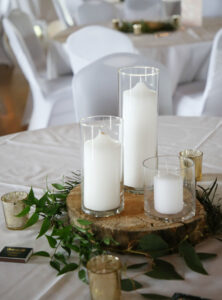 Table setting greenery wood candles rustic wedding